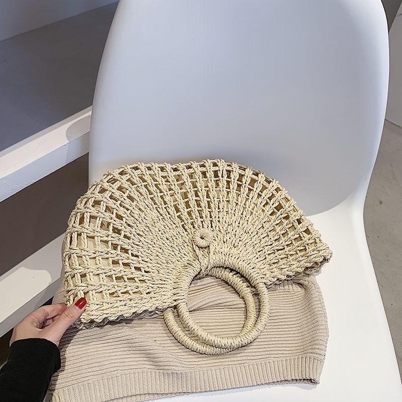2025 New Straw Woven Bag Bag Round Bucket Hollow Papyrus Woven Bag Korean Version Casual Portable Women's Bag Hand-held Crochet Bag