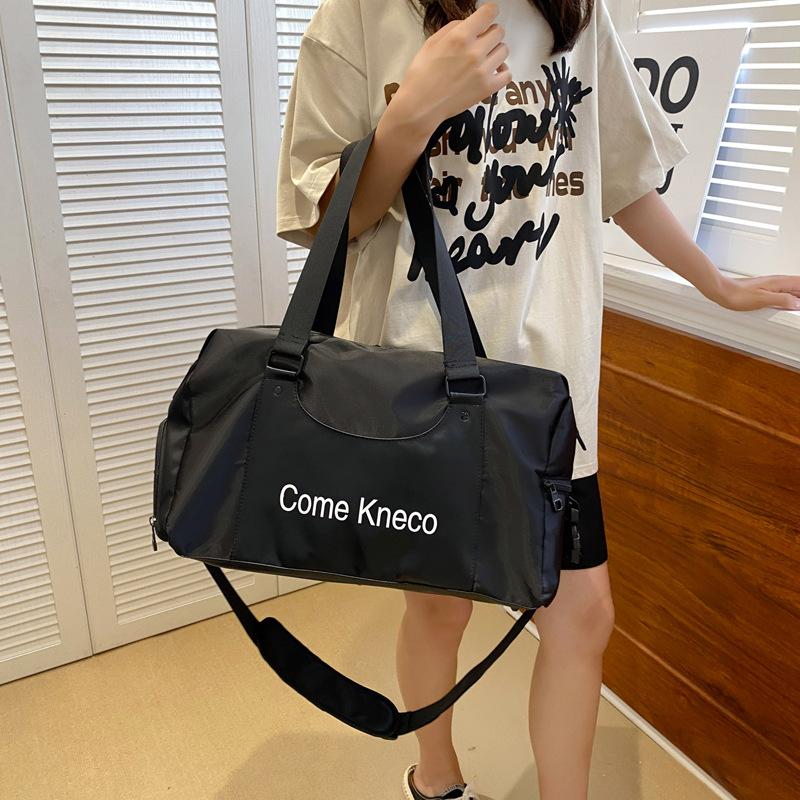 Fashion trend design model, go out, portable travel bag, wet and dry separation shoes, warehouse model, fitness bag, can cover the tie rod.