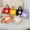Fashionable Nylon Kids Handbag Featuring Cute Bear Print And Breathable Design