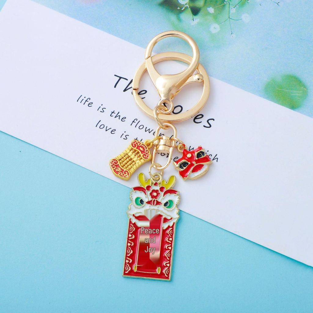 Year of the Dragon Waking Lion Talisman Keychain: Prosperity and Joy for the New Year