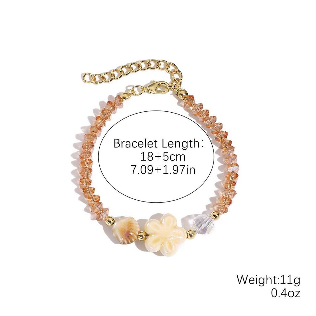 Seaside Elegance: Starfish & Shell Bead Bracelet with Oceanic Flair