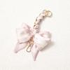 Elegant Hand-Woven Scarf Chain with Bow Decoration Pendant for Bag Strap Modification.