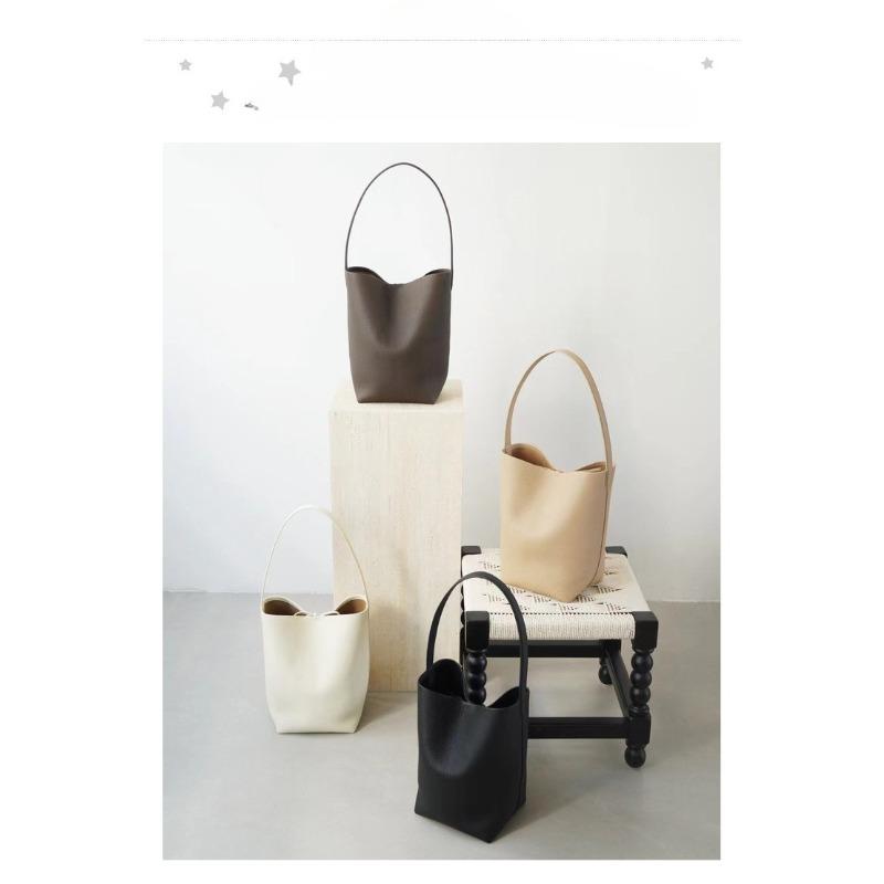 Haute couture niche TR bucket bag women's first layer cowhide minimalist high sense portable large capacity commuting shoulder tote bag