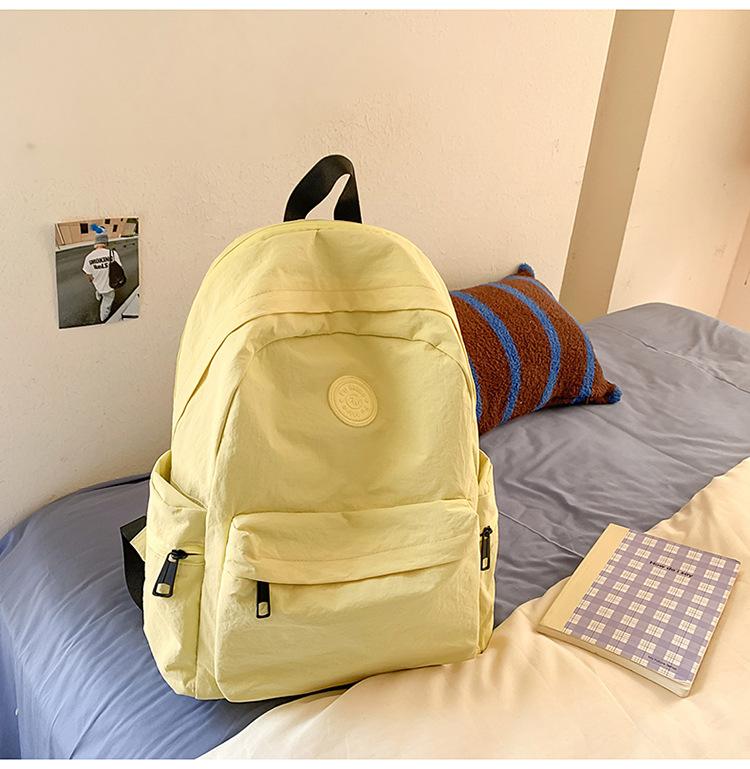 School bag Japanese simple solid color backpack light commuting large capacity student school bag casual versatile outdoor travel backpack