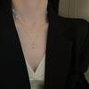Baroque Pearl Gold-Plated Two-Piece Necklace Set - French Retro Clavicle Design, Fashionable and Versatile for Women.