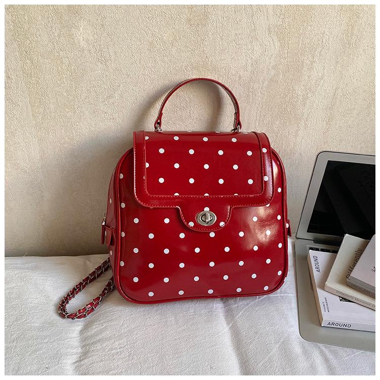 Schoolbag1011 Korean fashion portable Boston bag new niche design simple shoulder women's bag polka dot messenger bag