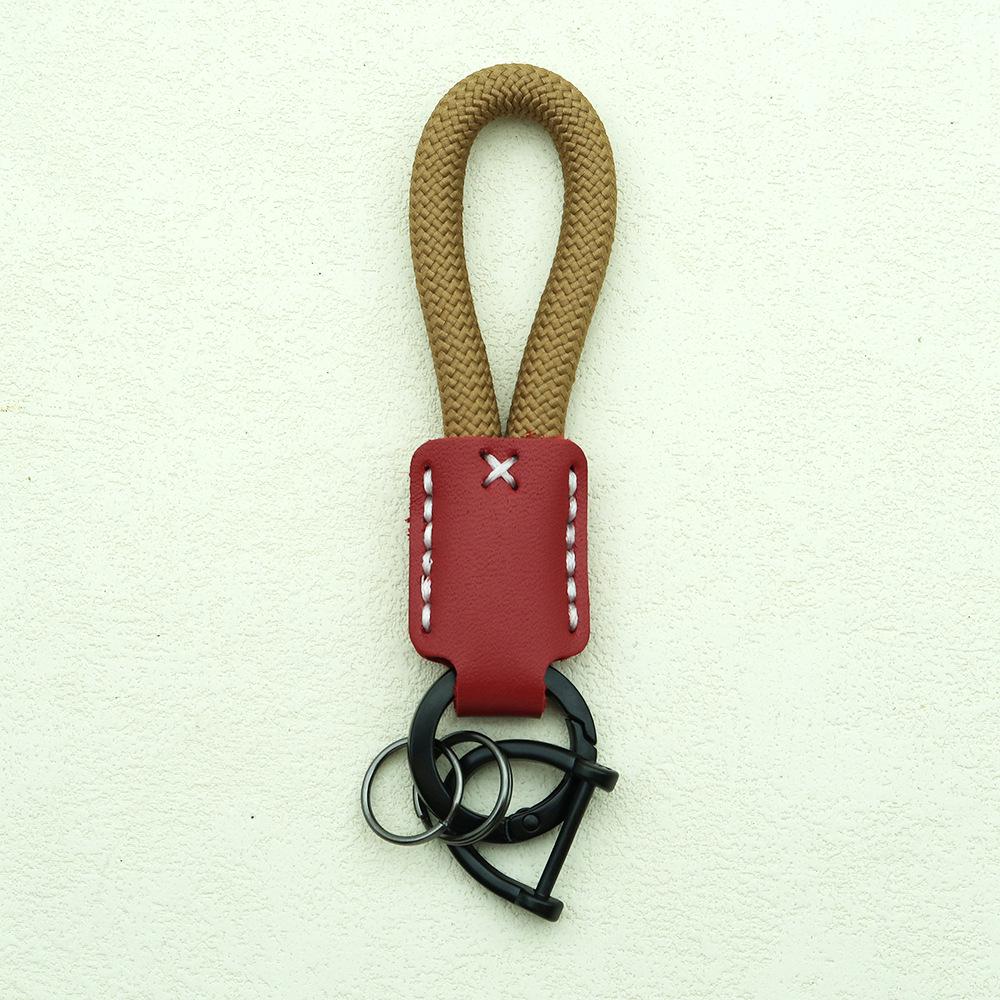 Hand-Woven Cowhide Leather Keychain Pendant with Logo Embossing - High-Quality Anti-Lost Car Lanyard