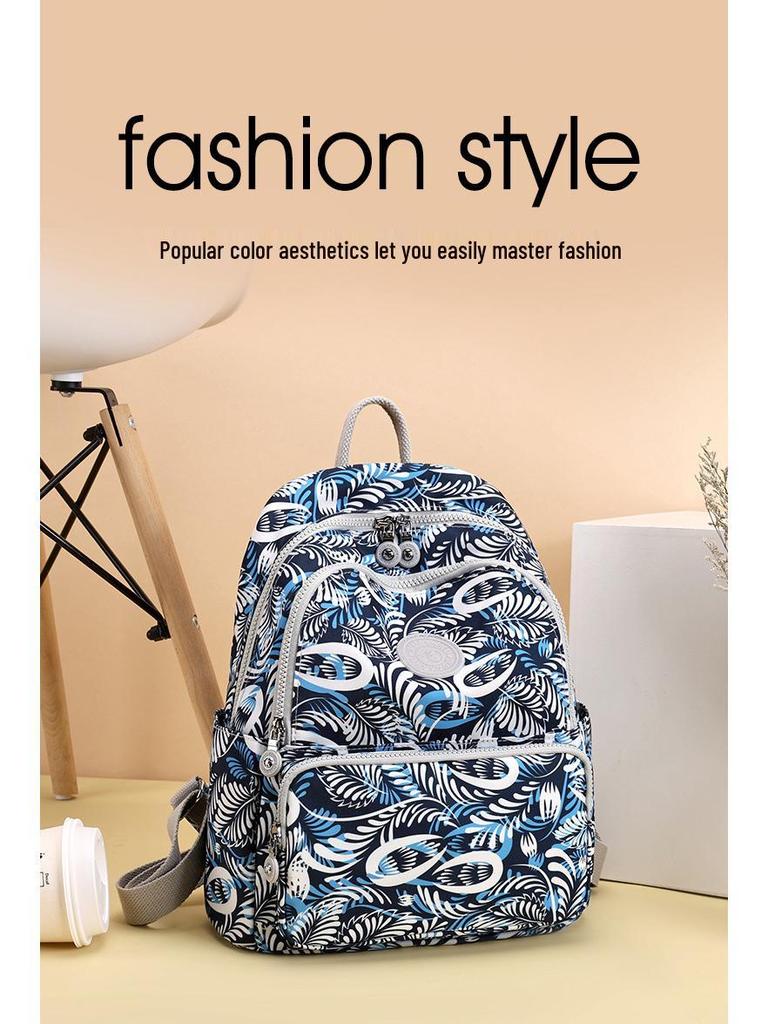 Mångsidig Tryckt Reseryggsäck i Nylon - Casual, Trendig och Enkel Mamma-väska