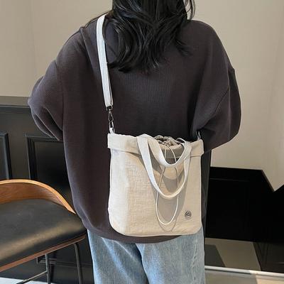 Hand Carry Canvas Small Bag Women 2025 New Bucket Bag Casual Shoulder Messenger Bag