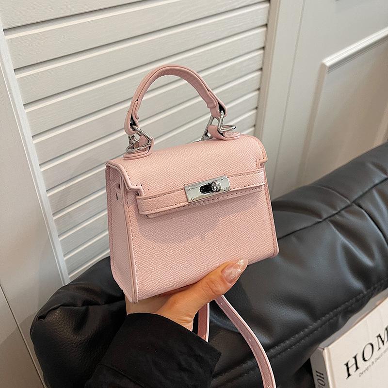 

New fashionable cross pattern mini Kaibaoli portable shoulder oblique span trendy women s bag розовый