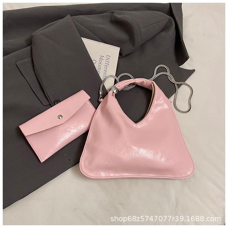 Niche design portable small bag women's 2025 new fashion versatile underarm shoulder bag commuting temperament hand bag