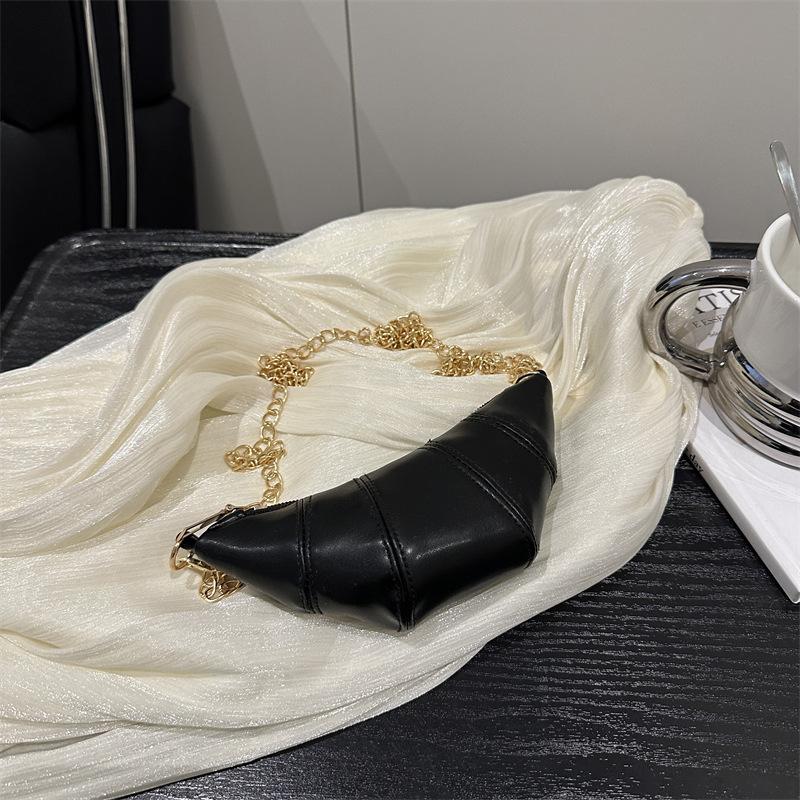 Корейская нишевая дизайнерская сумка женская в зарубежном стиле новая модная мини-сумка-круассан для выхода в свет милая шейная маленькая сумка-сатчел тренд