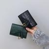 Women's 2022 Korean Style Crocodile Embossed Tri-Fold Wallet with D-ring Buckle Coin Pocket and Card Slots.