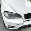 Auto-Scheinwerfer-Augenbraue Augenlid-Aufkleber für BMW X5 E70 30d 48i 30i 35d 40d 30d 50i 35i M50d 2006-2013 Zierleuchte Abdeckung Karosserie-Kits