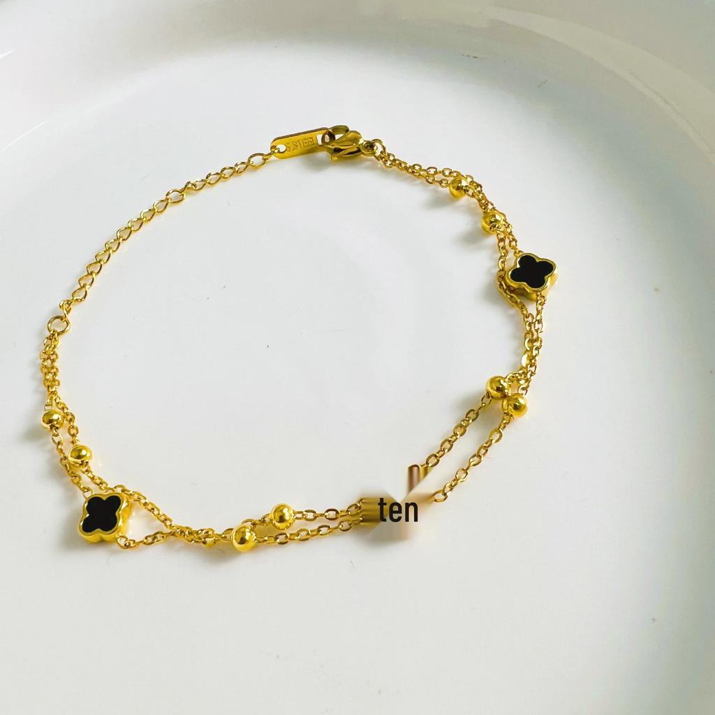 Bracelet Élégant Européen-Américain Double Couche Trèfle à Quatre Feuilles Acier Titane - Luxueux & Polyvalent