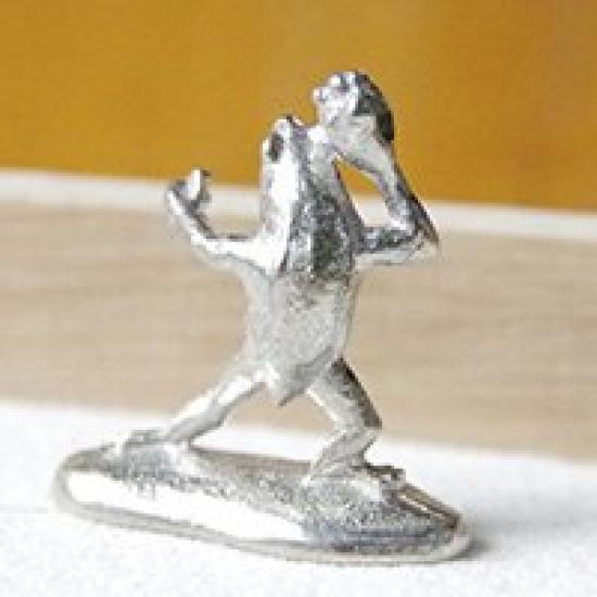 A miniature tin frog from the Choju Jinbutsu Giga perfect for your dry landscape painting, garden.