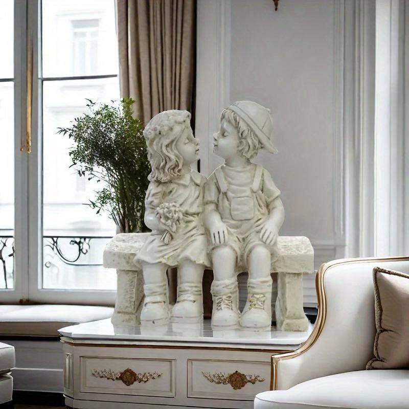 Endearing Sculpture: Kids Sharing a Kiss On the Bench