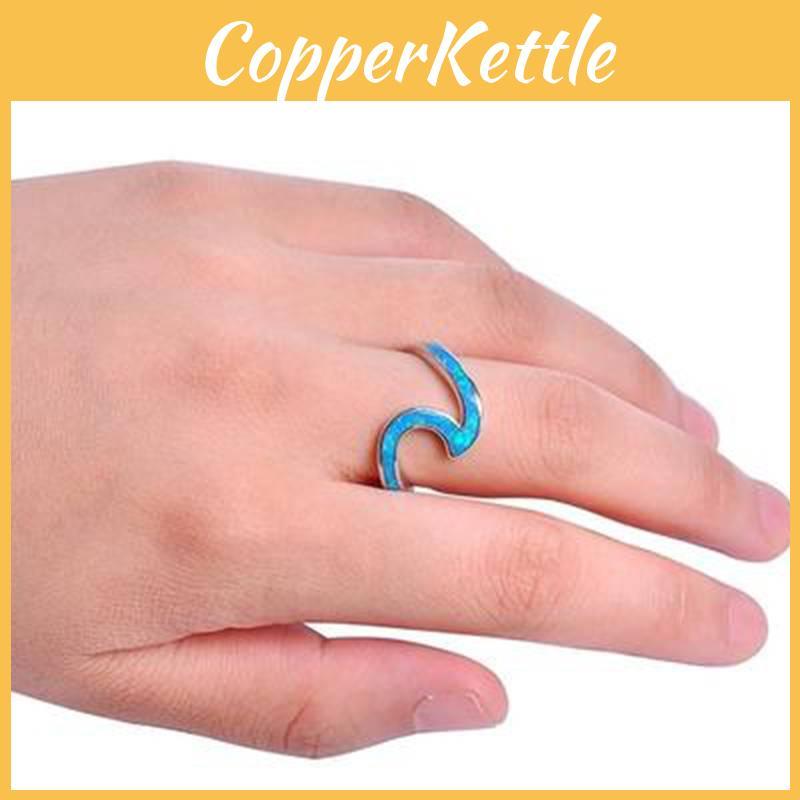 Versatile And Elegant Geometric Wave Ring In White And Green For All Occasions