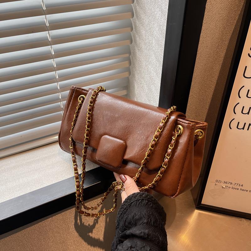 

Live bag women s bag 2025 spring new versatile soft leather shoulder bag niche trend fashion portable messenger bag коричневый