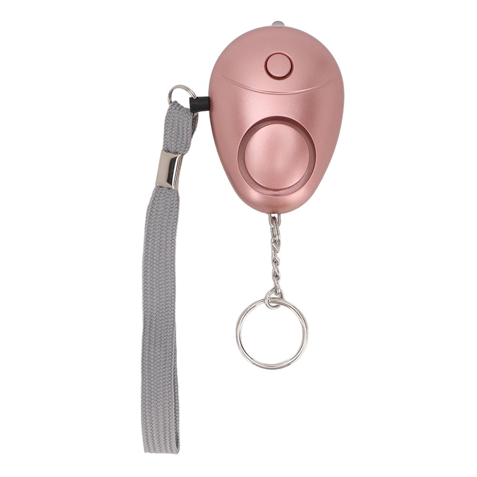 

Безпечний персональний звуковий сигналізатор Портативний аварійний сигналізатор безпеки 130 дБ зі світлодіодними ліхтарями для жінок, чоловіків, дітей, літніх людей Pink Gold