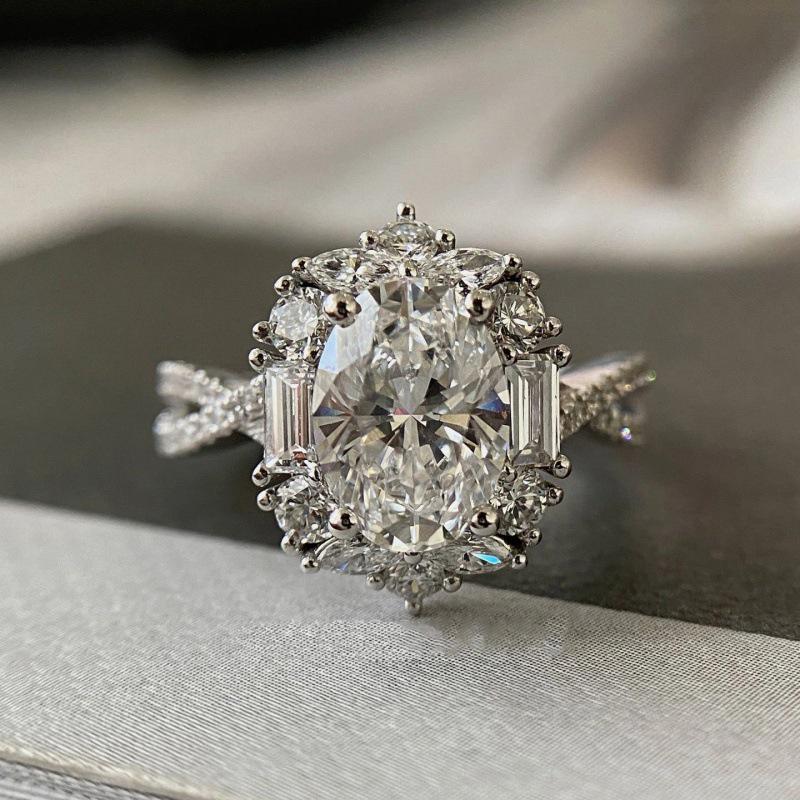 Elegant Simulated Moissanite Ring In White Gold with Pigeon Egg Diamond Design and Zirconia - Women's Luxury Jewelry.