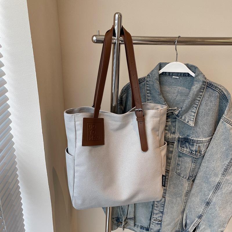 Niche shoulder bag commuter large capacity 2025 new casual aesthetic bag female college student class tote bag
