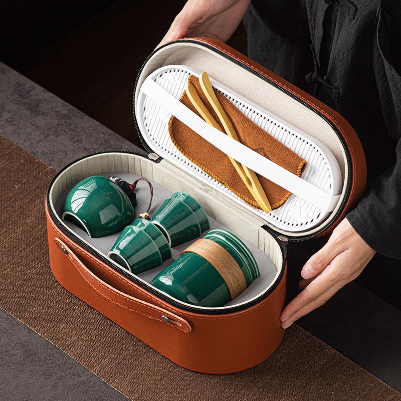 Ge kiln ceramic kung fu tea set, one pot of four cups, outdoor portable travel tea set, teacup gift souvenir