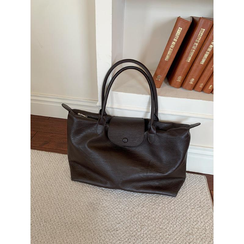 

Large-capacity commuter tote bag, black hand-held short-haul travel bag, light business trip, waterproof, portable luggage bag, female.