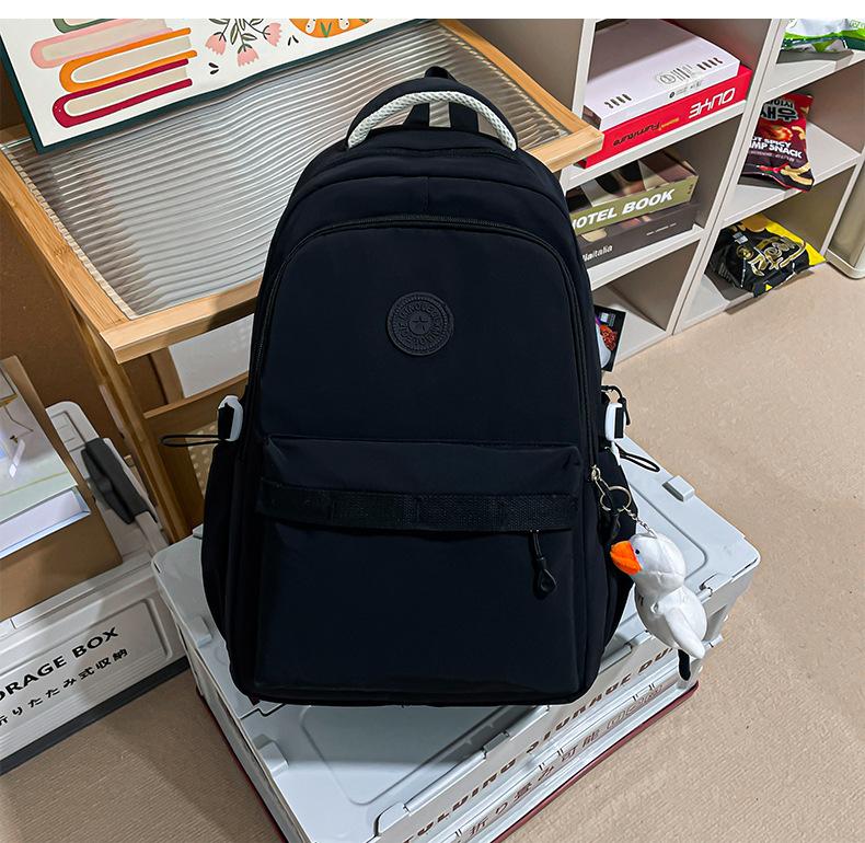 Schoolbag Large capacity class Commuter travel School bag Niche Korean female high school students Versatile simple casual lightweight backpack