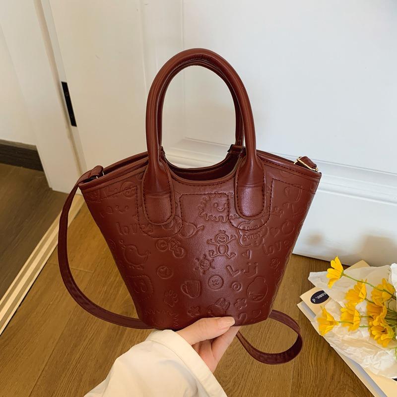 Summer Niche Embossed Bag Women's New Fashion Versatile Messenger Bag High-end Portable Bucket Bag