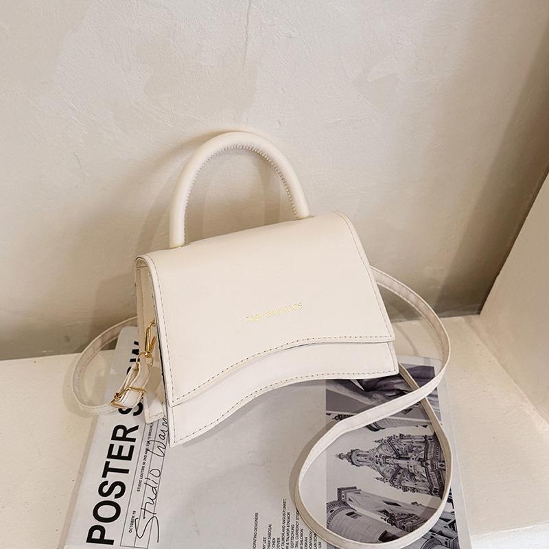 

2025 лето новый ретро нишевый дизайн тренд мода простой повседневный плечевой кроссбоди портативный маленькая квадратная сумка белый