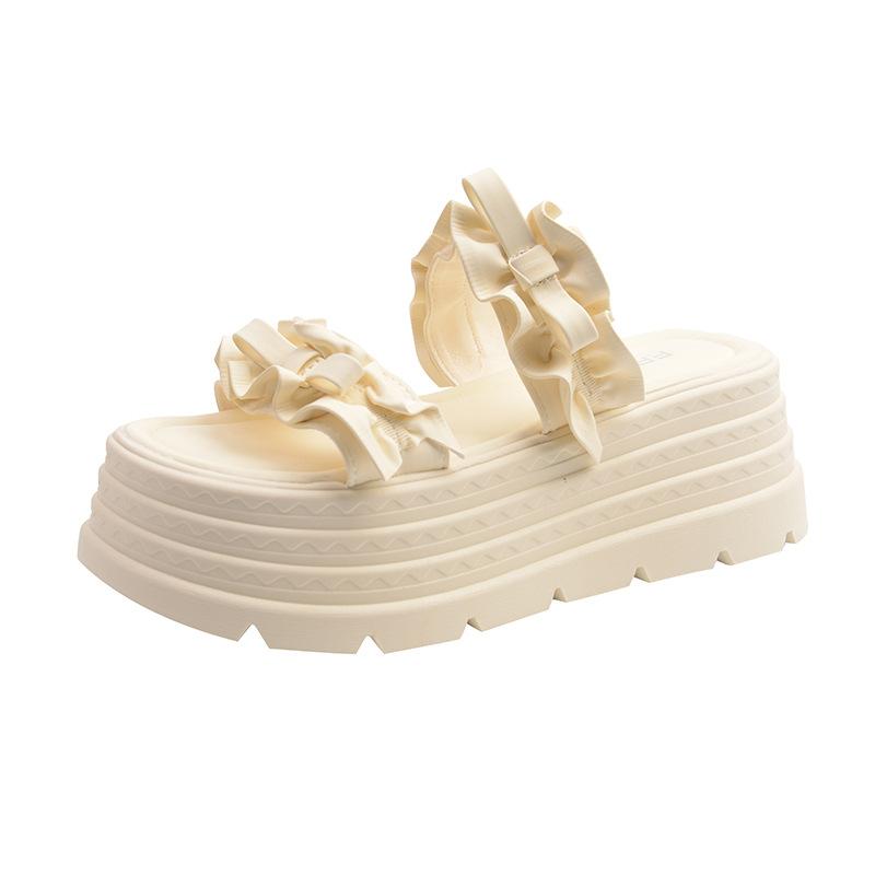 Thick-soled one-word slippers women's 2025 summer new pleated lace high-end wedge heel European goods show high outer sandals