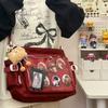 2025 College Style Dámská messenger taška s velkou kapacitou - Průhledný odznak s knoflíkem Ita Bag