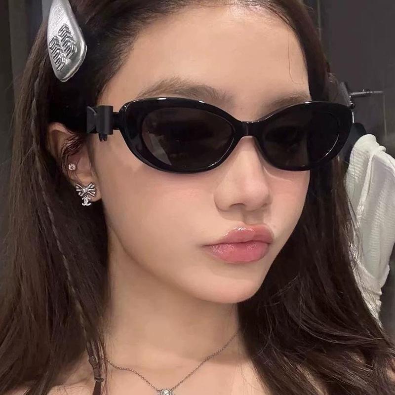 Fashion cat eye sunglasses bow decorative sunglasses women's high-end street photo UV-proof sunglasses