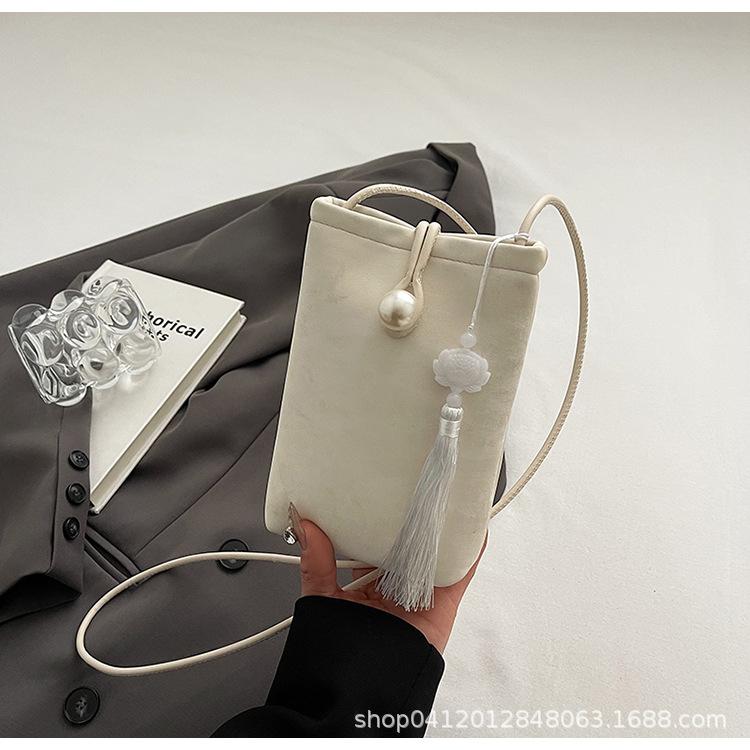 

Korean version of foreign style niche design mini women s bag Korean version of fashion messenger shoulder bag versatile Macaron small mobile phone ba