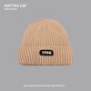 Knitted wool hat children's autumn and winter trendy brand bag head warm cold hat sticker letter big head circumference stacking hat