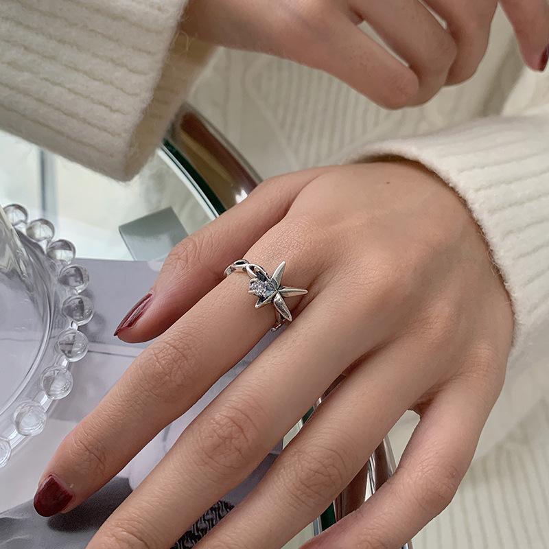 

Sterling 925 Fashionable Silver Ring For Women With Stylish Star Motif And Eyecatching Design Hollow