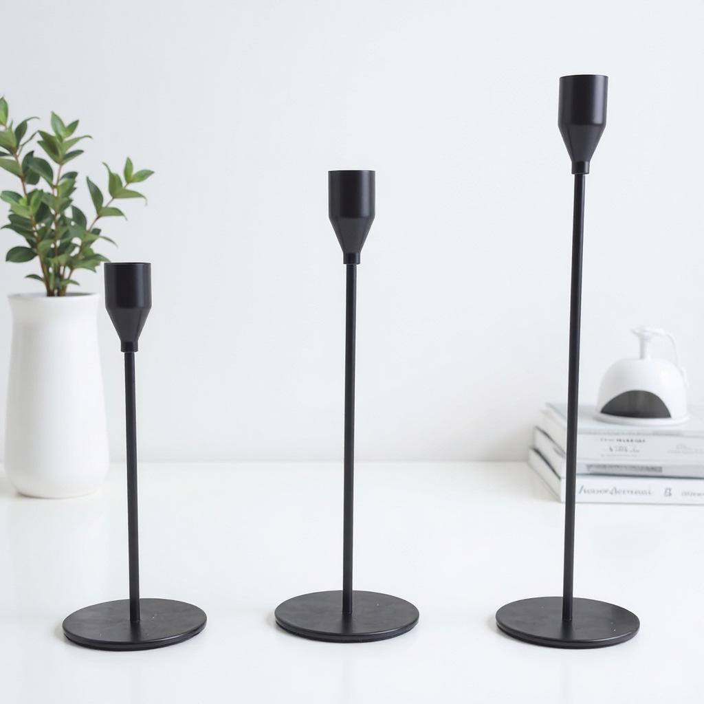 Elegant European Candle Holder Set: Electroplated Three-Piece Metal Ornament for High-End Dining and Wedding Décor.