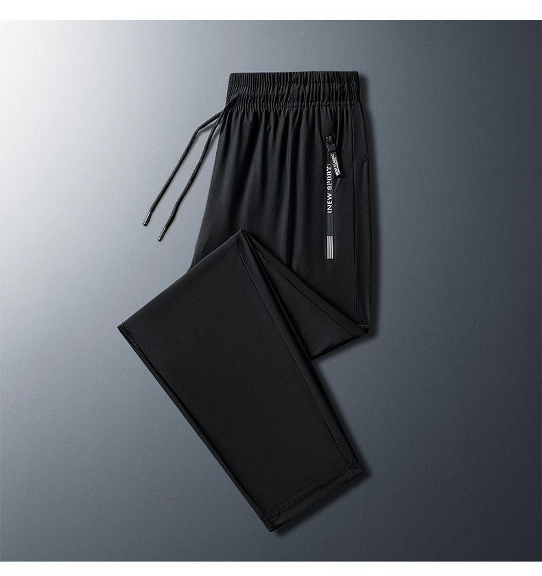 Pantaloni della tuta casual estivi da uomo in seta ghiacciata, sottili e traspiranti, con gamba dritta, tasche con cerniera e polsini.
