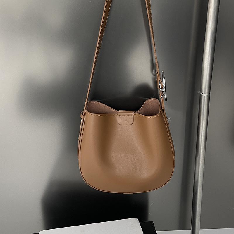 

2025 Женская сумка-седло из натуральной коровьей кожи - Элегантная сумка через плечо и на плечо для поездок на работу Base Length 26cm, Height 21cm, Base Thickness 9cm коричневый