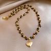 Collana con perle in occhio di tigre placcato oro 18 carati, catena per clavicola di lusso leggero, collana versatile retrò per donna