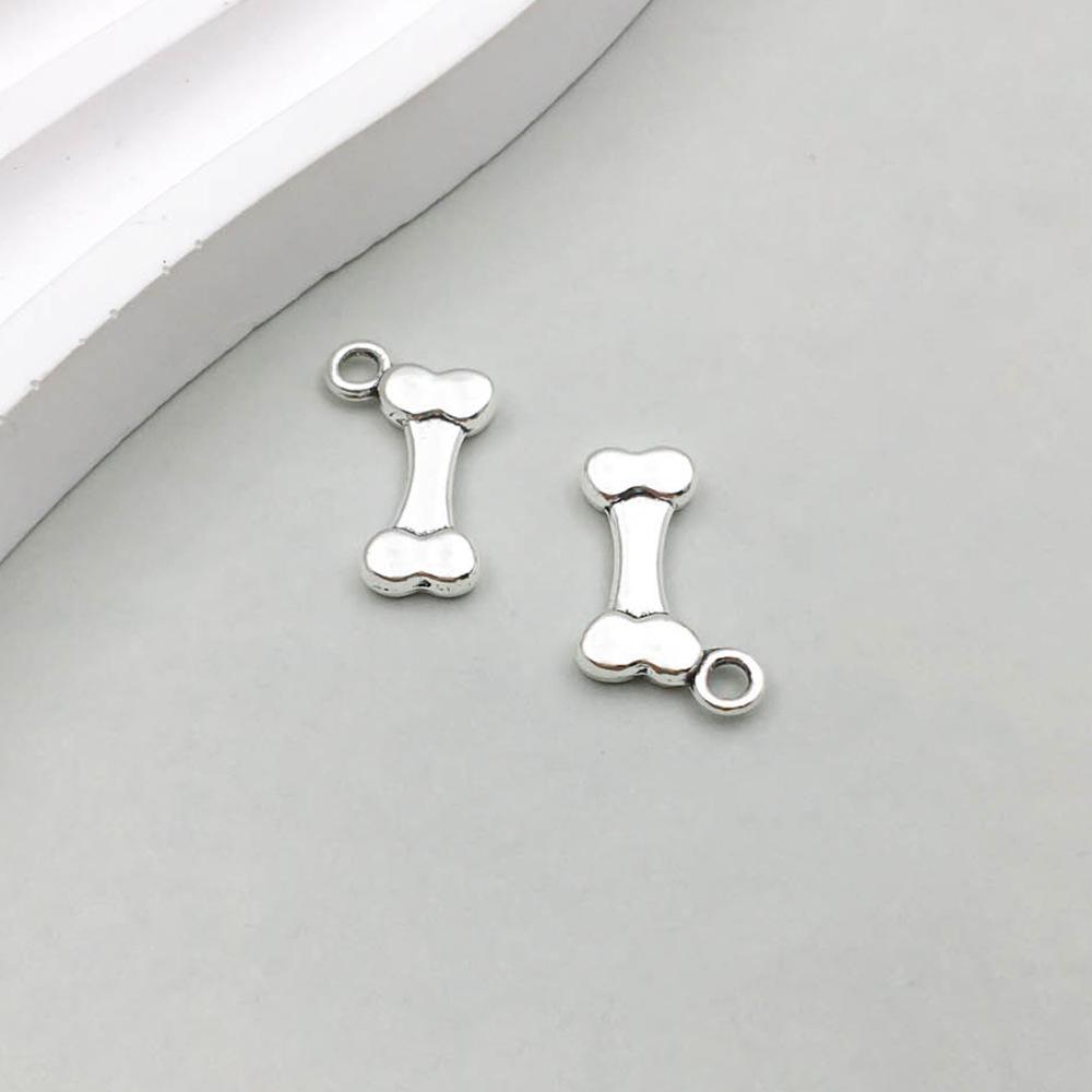 

Подвеска-шарм из серебряного сплава в виде кости животного, щенка