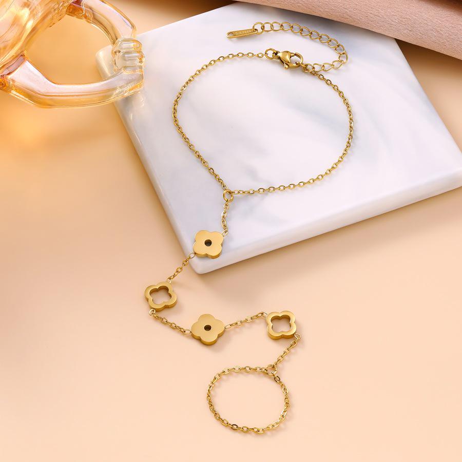 Titanium Steel Four-Leaf Clover Hollow Flower Hand Chain