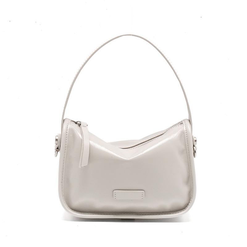 

Oil wax cowhide bag women s new versatile shoulder bag niche retro commuter messenger bag