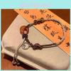 Chinese Distinctive Modern Amber Peace Knot Bracelet Handcrafted For Women