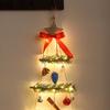 Luminous Christmas Tree Wall Decorations with Ornaments, Pine Cones, and Vines