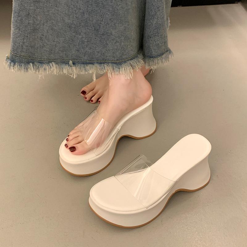 In the summer of 2025, the new thick-soled one-word transparent belt slippers with wedge heels and high-heeled sandals wear muffin women's shoes