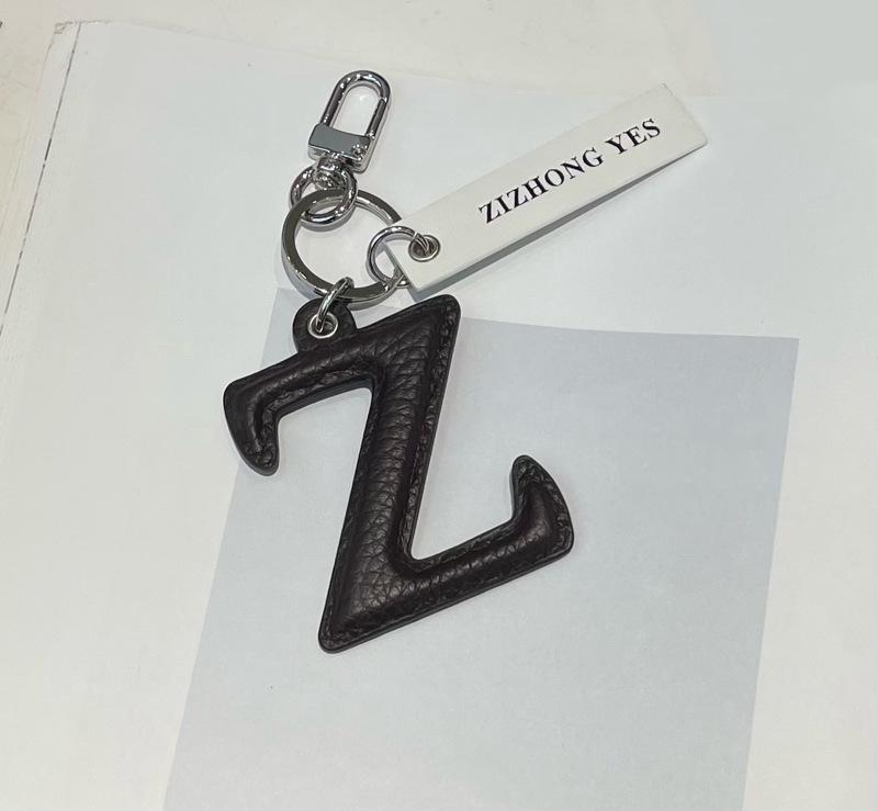 Stilvoller Schlüsselanhänger-Anhänger mit Buchstaben aus echtem Leder für Mädchen