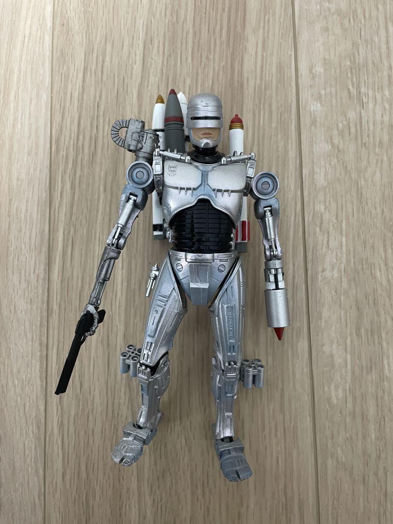 

[USED] Silver robot figure with missiles