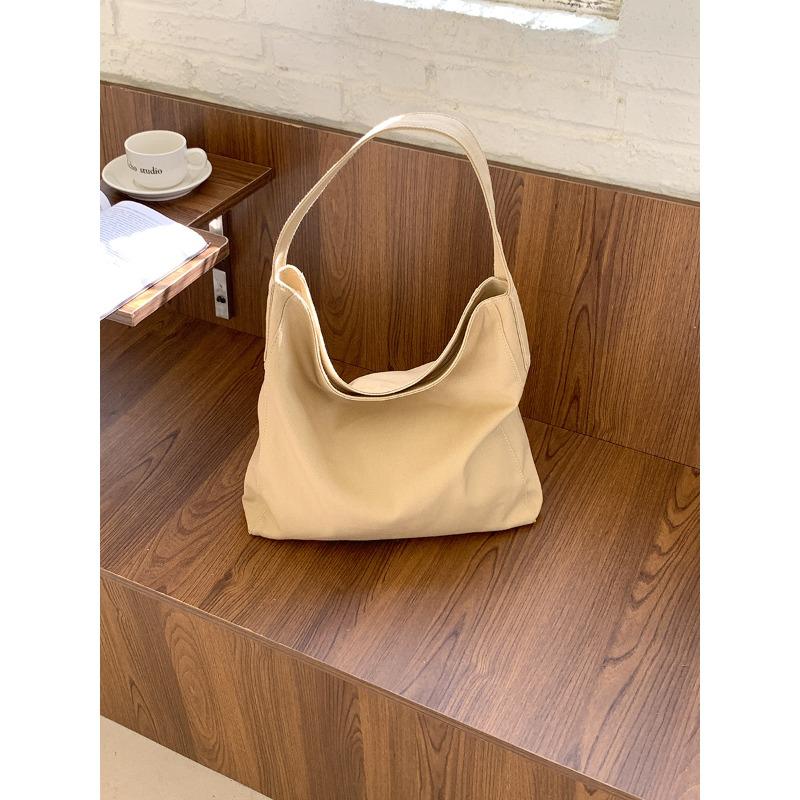 

Spring and summer new tote bag casual art canvas bag large capacity lazy wind niche commuter bag абрикосовый